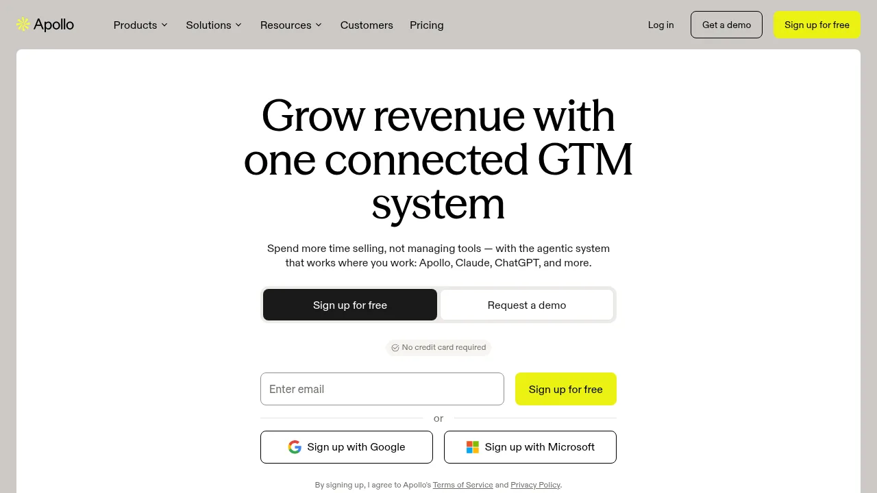 Apollo homepage with the headline Grow revenue with one connected GTM system and a free sign-up form